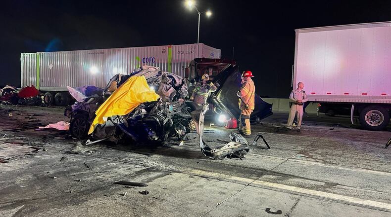 In this photo provided by the San Bernardino County District Attorney’s Office High Tech Crimes Unit, shows officials processing the scene of a deadly multi-vehicle crash Tuesday, Oct. 21, 2025, in Ontario, Calif. (San Bernardino County District Attorney’s Office High Tech Crimes Unit via AP)
