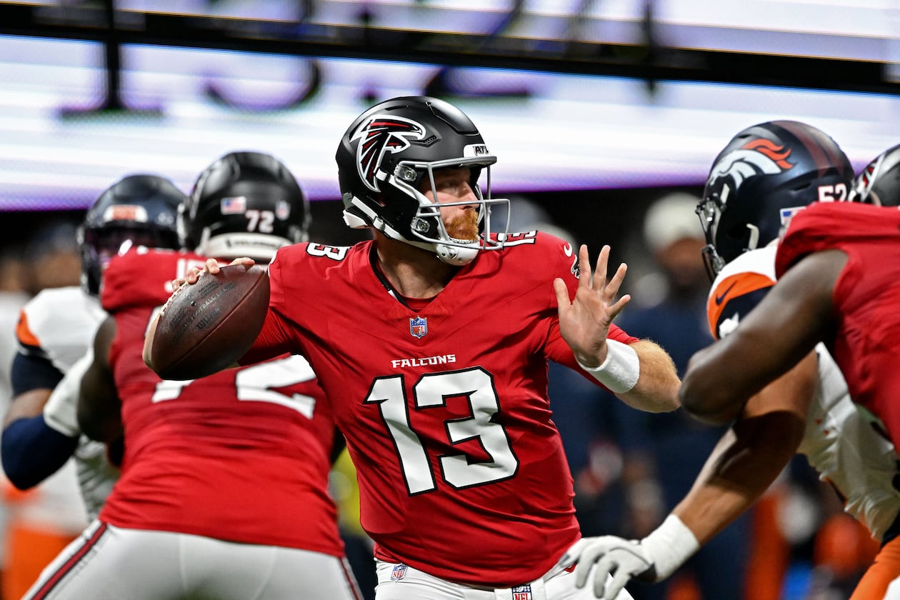 Atlanta Falcons quarterback Cooper Rush gets off a pass during the first half of an NFL preseason game at Mercedes-Benz Stadium on Friday, Aug. 14, 2026, in Atlanta. (Hyosub Shin/AJC)