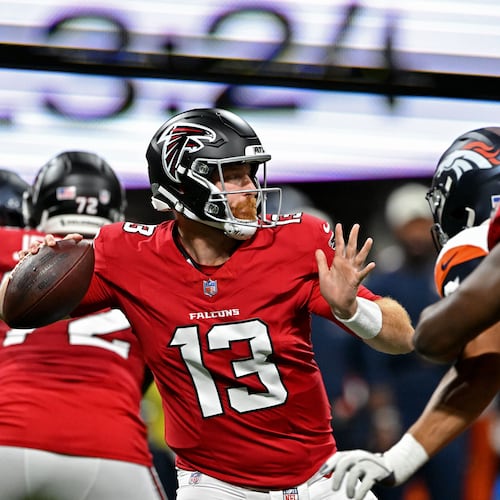 Atlanta Falcons quarterback Cooper Rush gets off a pass during the first half of an NFL preseason game at Mercedes-Benz Stadium on Friday, Aug. 14, 2026, in Atlanta. (Hyosub Shin/AJC)