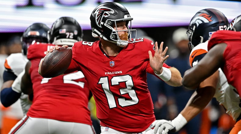 Atlanta Falcons quarterback Cooper Rush gets off a pass during the first half of an NFL preseason game at Mercedes-Benz Stadium on Friday, Aug. 14, 2026, in Atlanta. (Hyosub Shin/AJC)
