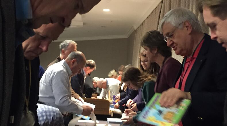 The Rotary Club of Dunwoody gave 1,800 DeKalb County students books at a recent event.