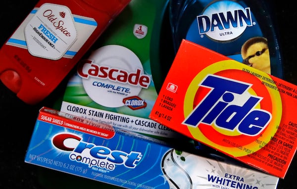 FILE- In this June 15, 2018, file photo a variety of Procter & Gamble products rest on a counter in East Derry, N.H. Procter & Gamble Co. reports financial earns on Oct. 22, 2019. (AP Photo/Charles Krupa, File)
