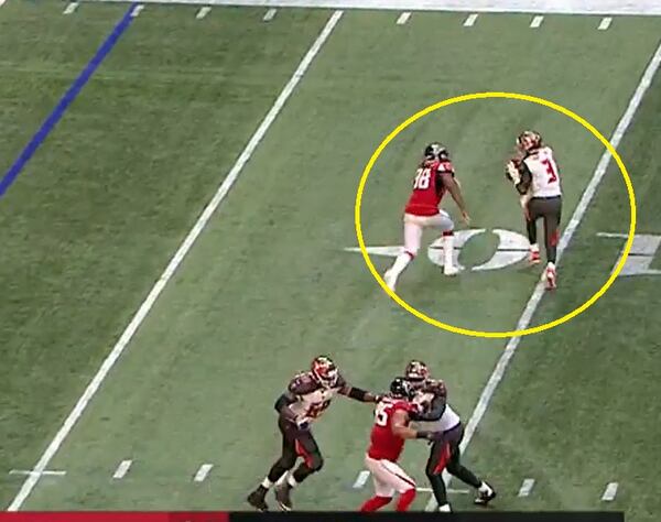 With the score 24-22, Falcons defensive end Takk McKinley chases Bucs quarterback Jameis Winston and forces an incompletion on the two-point conversion attempt.  