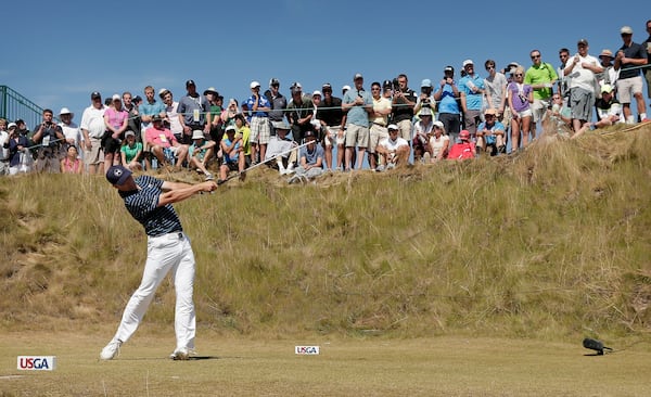 FILE - Jordan Spieth watches his tee shot on the sixth hole during the final round of the U.S. Open golf tournament at Chambers Bay on Sunday, June 21, 2015, in University Place, Wash. (AP Photo/Charlie Riedel, File)