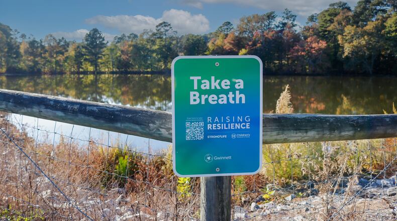 A new joint effort between Children’s Healthcare of Atlanta, Live Healthy Gwinnett and Gwinnett Parks and Recreation has placed scannable signs along walking paths to virtually introduce children and families to healthy habits and coping skills. COURTESY GWINNETT COUNTY