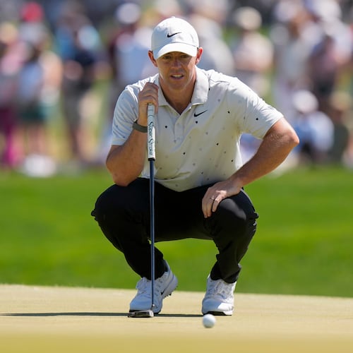 Rory McIlroy, of Northern Ireland, lines up his shot on the 16th green during the third round of the PGA Championship golf tournament at Aronimink Golf Club, Saturday, May 16, 2026, in Newtown Square, PA. (AP Photo/Frank Franklin II)