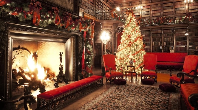 The Biltmore House library gets all decked out at Christmas time. The entire Biltmore Estate will show off some 70 hand-decorated Christmas trees during the holiday season.
