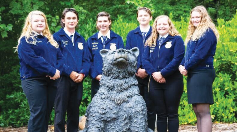 The Creekview High School FFA Chapter during the National FFA annual conference received official recognition as a Top 10 National Model of Excellence chapter! The Chapter was named a finalist for the honor earlier this fall in recognition of its exemplary efforts in growing leaders, building communities, and strengthening agriculture, with the overall top chapter in the Nation named during the convention that recently was held virtually. Creekview FFA earned the Top 10 recognition through its application highlighting its best activities from the previous school year, including its Doggy Day Care; Summer STEM Camp for elementary students; Living to Serve School, Farm which includes 32 small raised beds and chickens for egg production; food drives for House of Hope; and the Pamper Me Backpack toiletry drive for local students in need. The Chapter was led by the following officers for the 2019-2020 school year: President Ceri Trecartin, Vice President Cheyenne McIntyre, Secretary Andrew Carlisle; Reporter Jeb Stewart, Treasurer Emma Martin, Sentinels Matthew Martin and Ben Karcher, Historian Eli Cook and Chaplain Maddy Addy. FFA President Jeb Stewart, Vice President Eli Cook and FFA member Gabriella Rose made the presentation for the final competition. The Creekview FFA Chapter advisors are teachers Pauline Benton and Wyatt Wilkie.