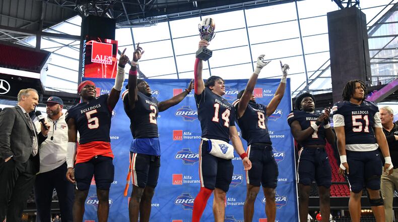 Toombs County, shown here celebrating their victory over Northeast Macon in the GHSA Class A Division I state championship game last year, is trying to reach the finals for the second season in a row. (Hyosub Shin/AJC 2024)