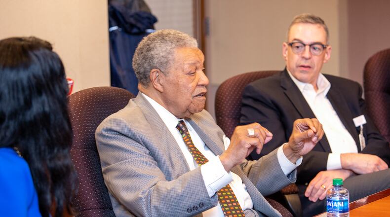 Fulton County Commissioner Robb Pitts, center, calls a meeting with Grady Hospital executives, including John Haupert, right, Grady Health System President and CEO; as well as Fulton-DeKalb Hospital Authority board members and other commissioners including Natalie Hall, left, on Tuesday, April 12, 2022 to discuss the upcoming closure of hospital beds and the ER at Wellstar Atlanta Medical Center South, the only acute care hospital within Fulton County south of I-20.  (PHOTO by Jenni Girtman for The Atlanta Journal-Constitution)