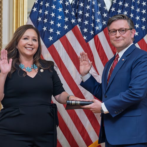 Speaker of the House Mike Johnson, R-La., holds a ceremonial swearing-in for Rep. Adelita Grijalva, D-Ariz., left, at the Capitol in Washington, Wednesday, Nov. 12, 2025. (AP Photo/J. Scott Applewhite)