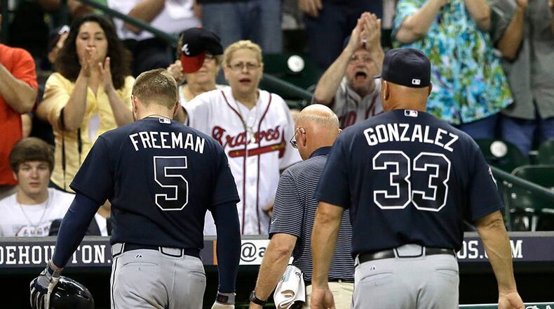 Freddie Freeman left Wednesday’s game in Houston after getting hit on the back of the right elbow by a fastball from Astros left-hander Darin Downs in the eighth inning.