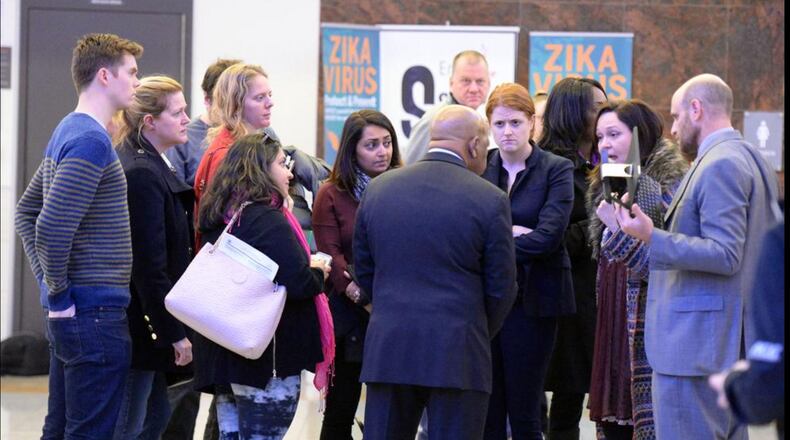 U. S. Congressman John Lewis (D-Ga) speaks with activists and attorneys outside the Customs and Border Protection office at Hartsfield Jackson International airport Saturday January 28, 2017 after at least 4 people were detained earlier today after an executive order from President Trump limited immigration into the United States. Kent D. Johnson/AJC