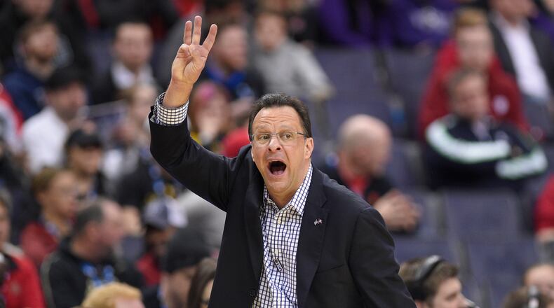 Indiana coach Tom Crean signals during the second half of the team's NCAA college basketball game against Wisconsin in the Big Ten tournament, Friday, March 10, 2017, in Washington. Wisconsin won 70-60. (AP Photo/Nick Wass)