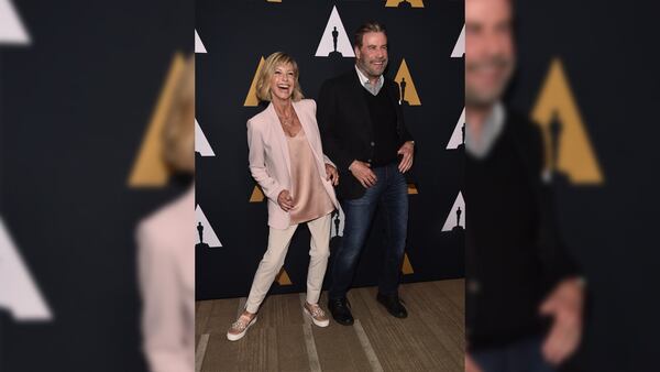 Olivia Newton-John (L) and John Travolta attend the 'Grease' 40th anniversary screening at Samuel Goldwyn Theater on August 15, 2018 in Beverly Hills, California.