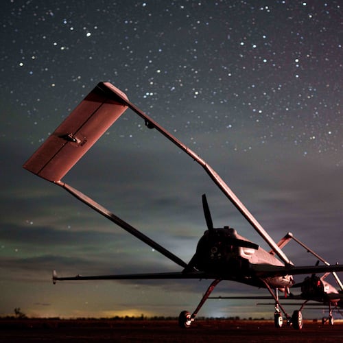 Long-range drones An-196 Liutyi of the Ukrainian 14th Separate Unmanned Aerial Systems Regiment stand in line before takeoff in undisclosed location, Ukraine, Tuesday, Oct. 14, 2025. (AP Photo/Evgeniy Maloletka)
