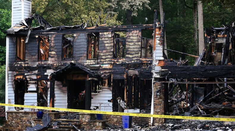 Investigators are working to determine the cause of the fire at the home in Roswell.