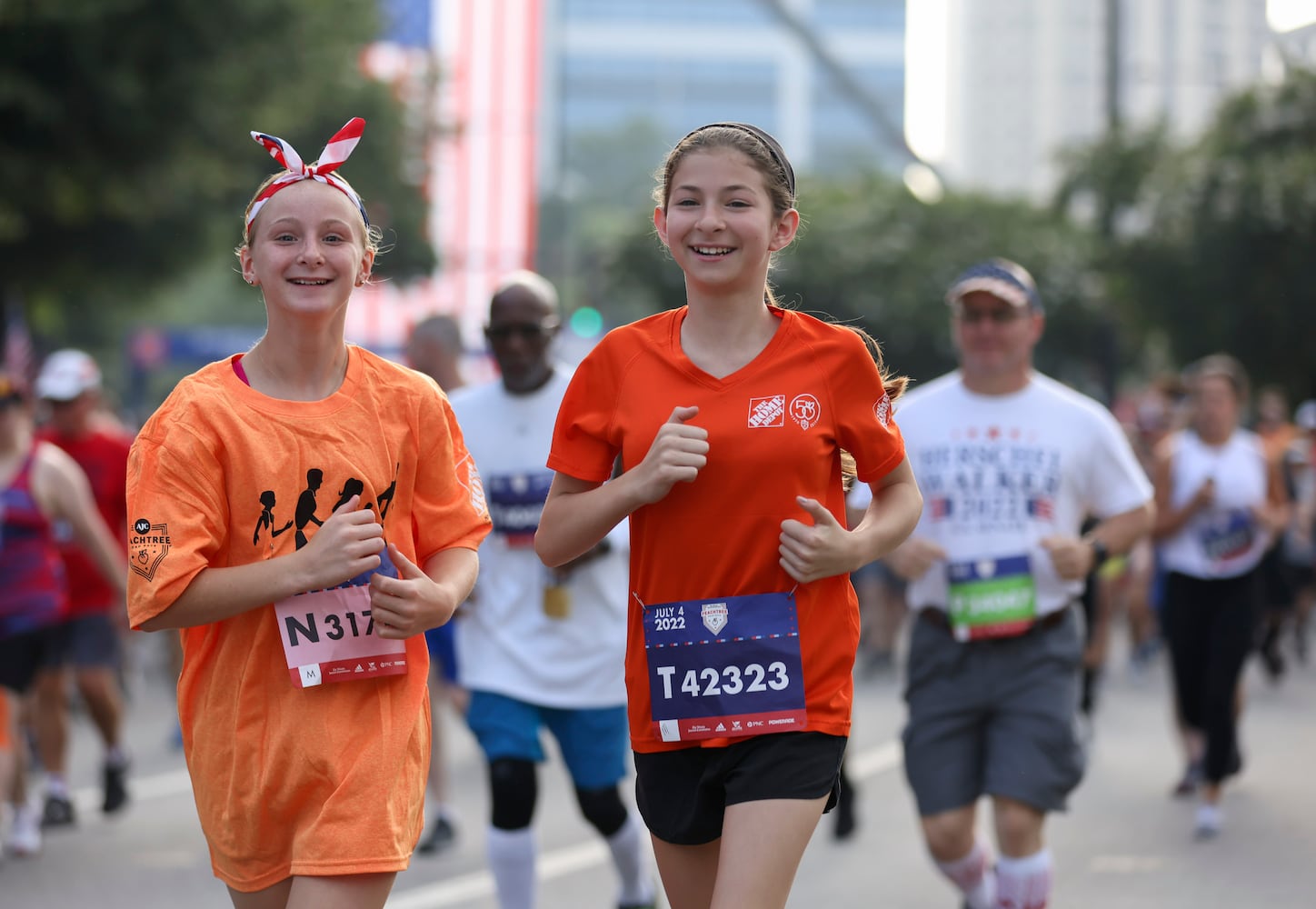 Runners at the 53rd running of the Atlanta Journal-Constitution Peachtree Road Race in Atlanta on Monday, July 4, 2022. (Jason Getz / Jason.Getz@ajc.com)