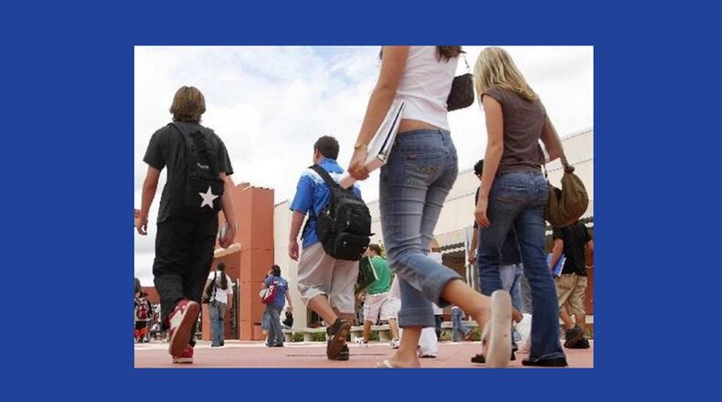 As the Cherokee County School District plans the new school year starting Aug. 3, it will ask parents if they prefer their children learning in school or online. AJC FILE