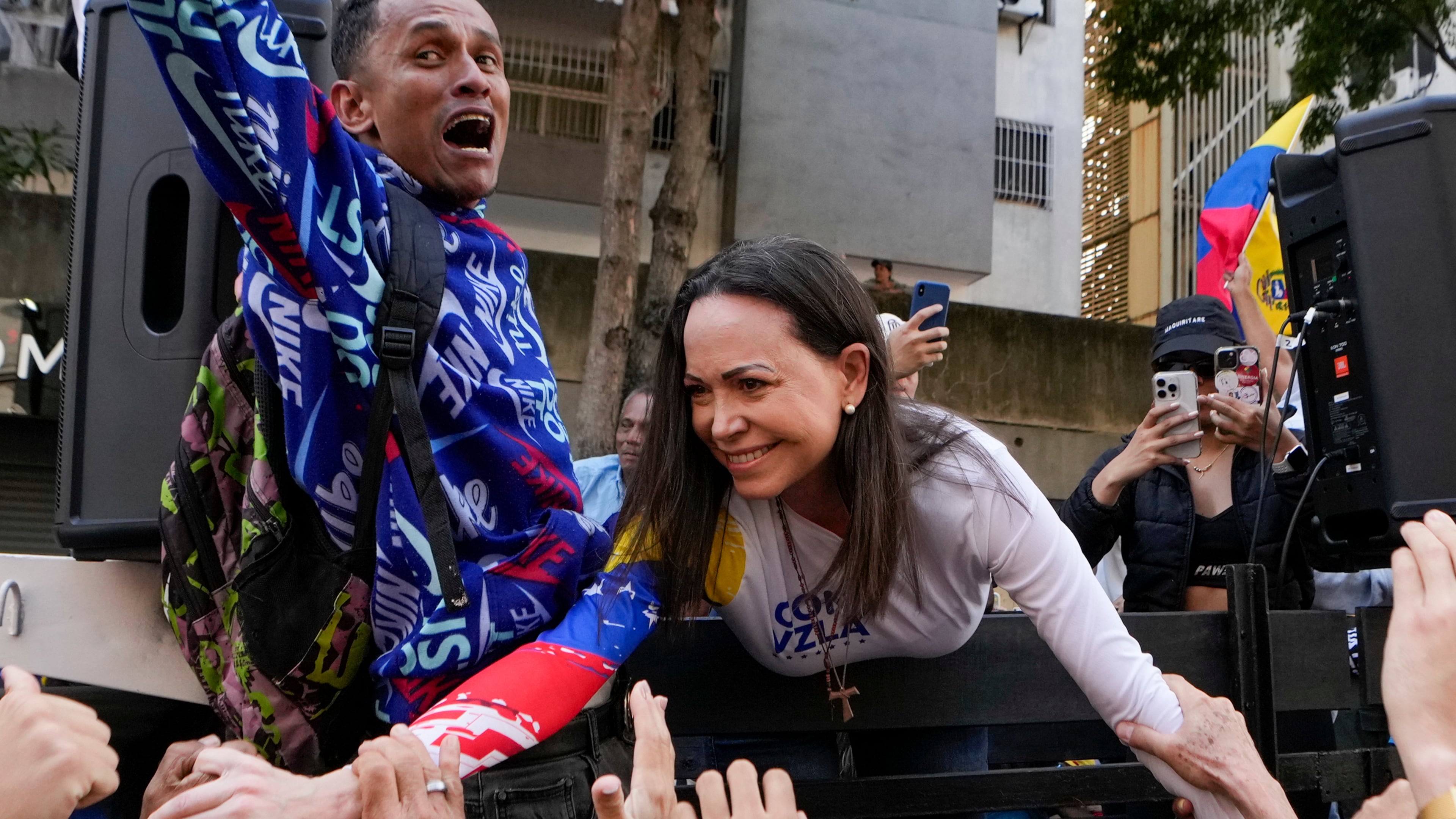 FILE - Opposition leader Maria Corina Machado greets supporters during a protest against Venezuelan President Nicolas Maduro the day before his inauguration for a third term in Caracas, Venezuela, Thursday, Jan. 9, 2025. (AP Photo/Matias Delacroix, file)
