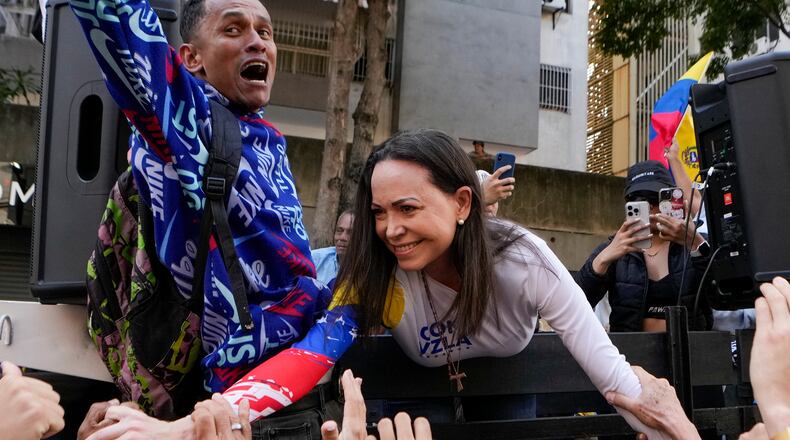 FILE - Opposition leader Maria Corina Machado greets supporters during a protest against Venezuelan President Nicolas Maduro the day before his inauguration for a third term in Caracas, Venezuela, Thursday, Jan. 9, 2025. (AP Photo/Matias Delacroix, file)