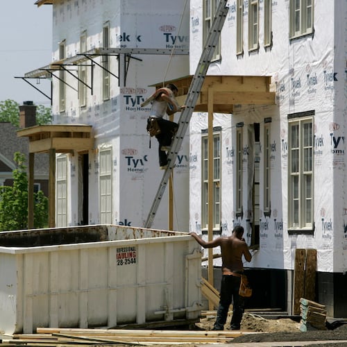 FILE - Luxury homes are under construction in a subdivision, May 22, 2007 in New Albany, Ohio. (AP Photo/Kiichiro Sato, File)