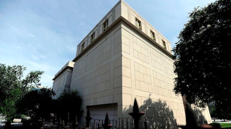 The former World of Coca-Cola building next to Underground Atlanta has been largely vacant since the beverage company moved its museum blocks away to near Centennial Park in 2007. The building, currently managed by the State Building Authority, is shown in 2013. David Tulis / AJC Special