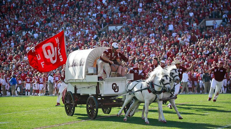 NORMAN, OK - NOVEMBER 25: The Sooner Schooner takes the field after a touchdown against the West Virginia Mountaineers at Gaylord Family Oklahoma Memorial Stadium on November 25, 2017 in Norman, Oklahoma. Oklahoma defeated West Virginia 59-31. (Photo by Brett Deering/Getty Images) *** Local Caption ***