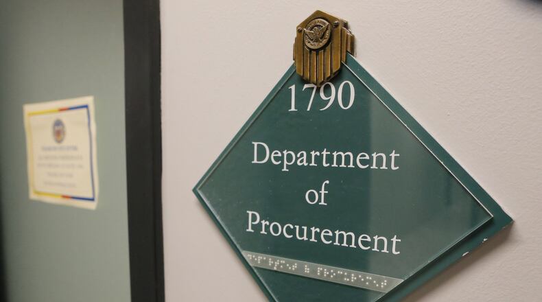 Federal agents on Tuesday, Feb. 21, 2017, served a subpoena and seized a computer from the office of the city’s top purchasing officer, Adam Smith. Smith was fired the same day. BOB ANDRES /BANDRES@AJC.COM