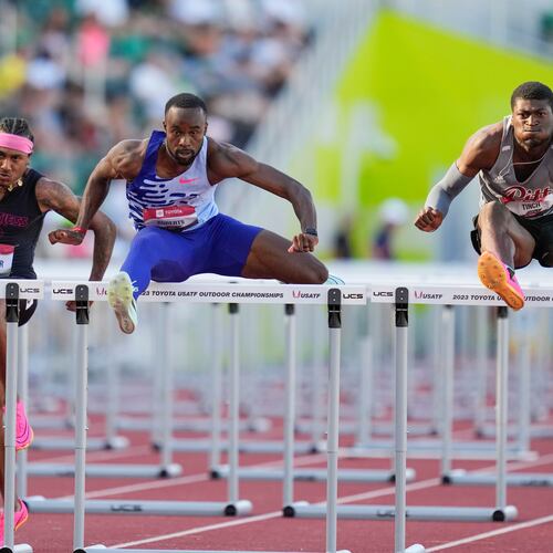 FILE - Daniel Roberts and Cordell Tinch compete in the men's 110 meter hurdles semifinal during the U.S. track and field championships in Eugene, Ore., Sunday, July 9, 2023. Left is Eric Edwards. (AP Photo/Ashley Landis, File)
