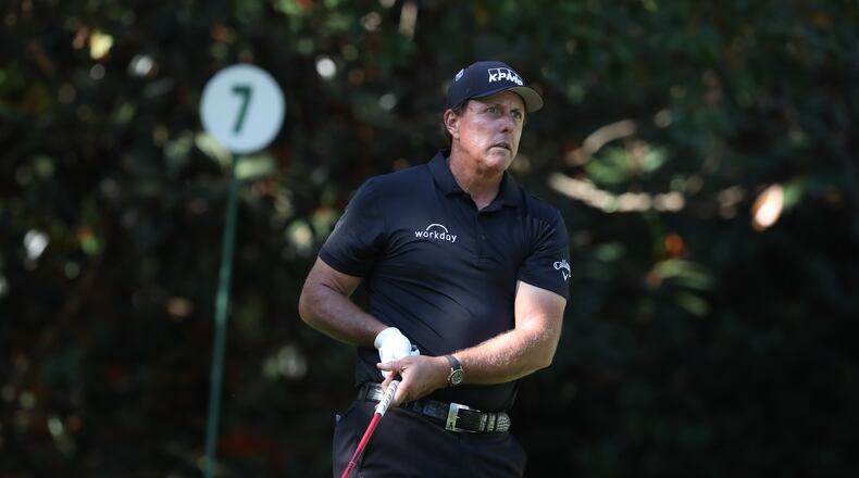 Phil Mickelson tees off on the 7th hole during the second round of the Masters Friday at Augusta National.(Curtis Compton/Atlanta Journal-Constitution/TNS)