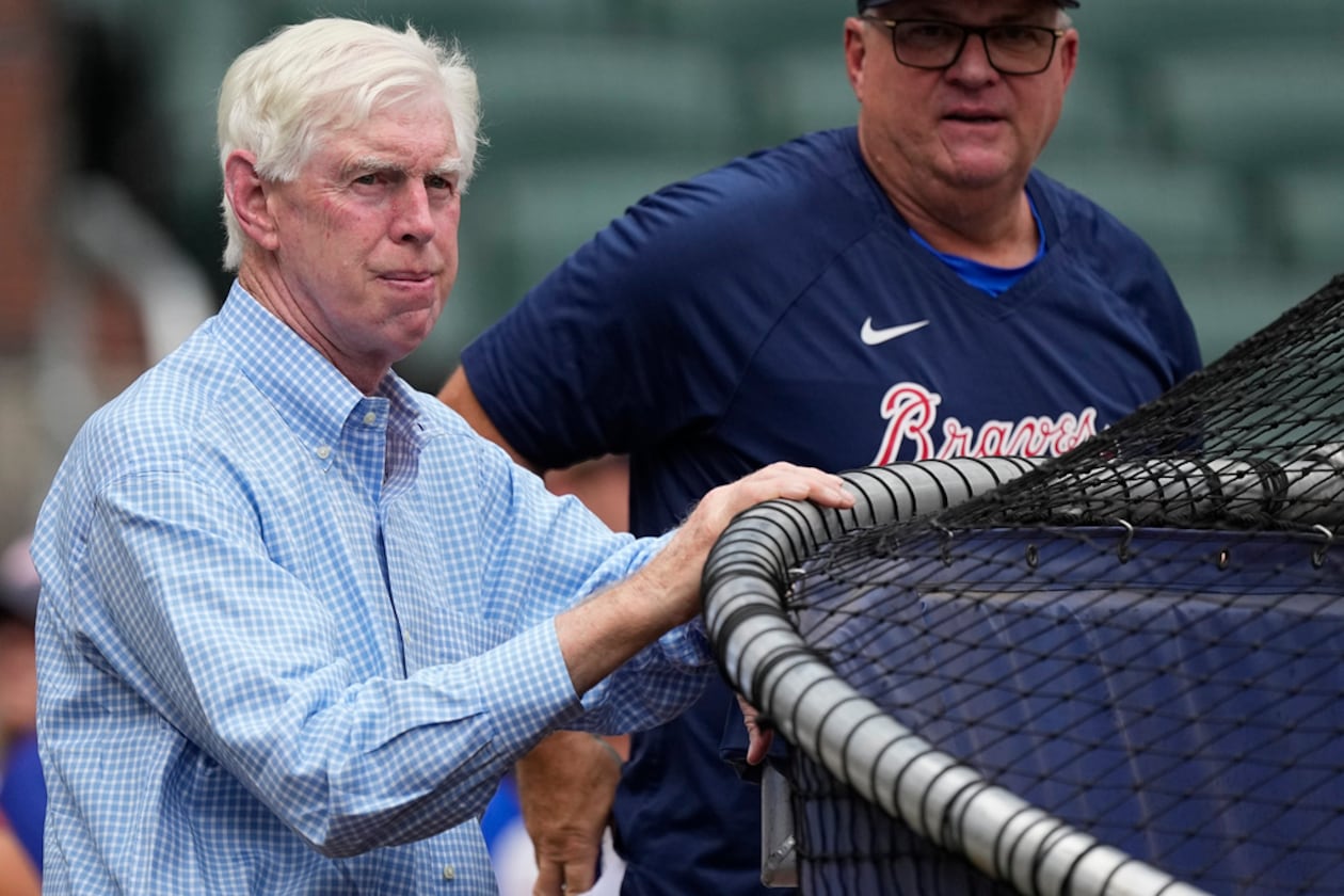 Braves chairman Terry McGuirk — pictured watching batting practice before a July 2023 game — said Wednesday of the team's 2026 player payroll plans: “I think I’ve stated in the past that our goals are to be a top-five salary team. … I think we are capable of doing that." (John Bazemore/AP 2023)