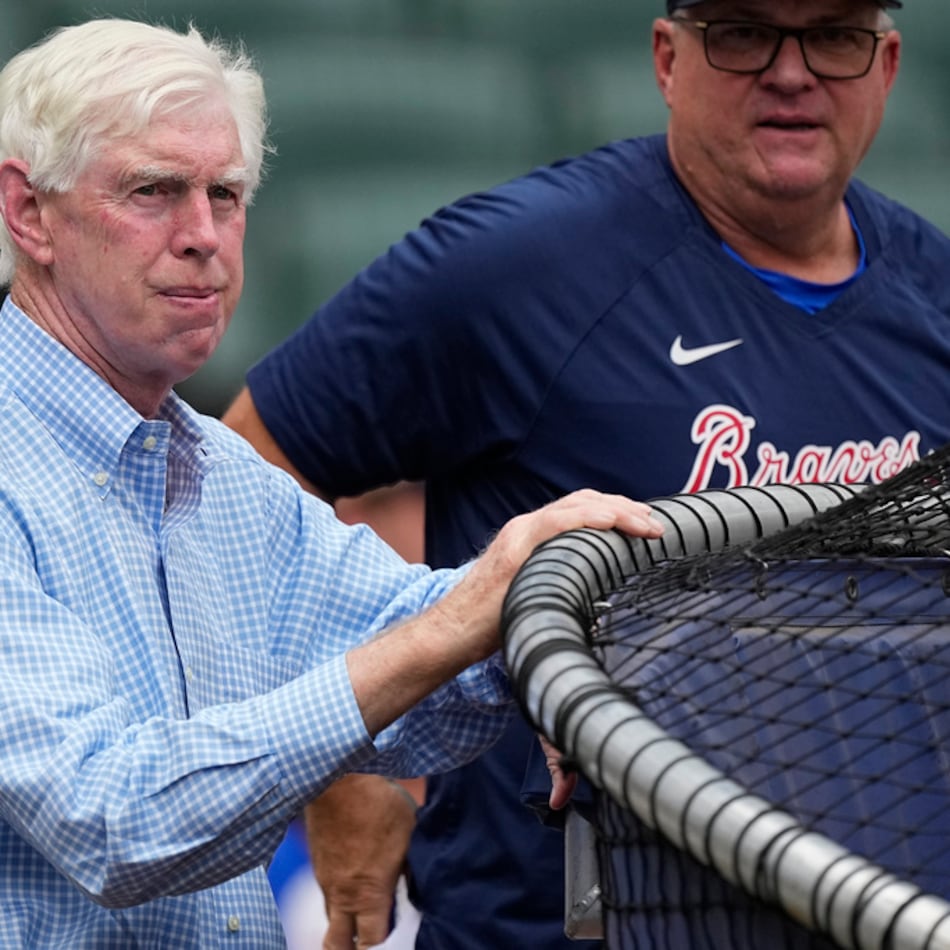 Braves chairman Terry McGuirk — pictured watching batting practice before a July 2023 game — said Wednesday of the team's 2026 player payroll plans: “I think I’ve stated in the past that our goals are to be a top-five salary team. … I think we are capable of doing that." (John Bazemore/AP 2023)