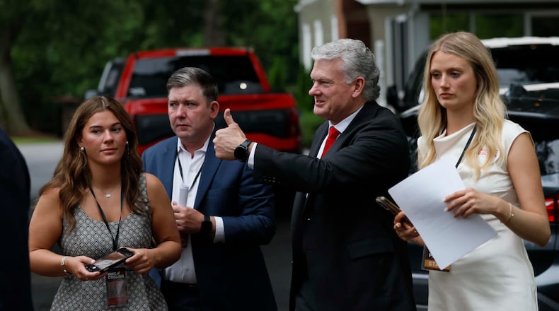 U.S. Rep. Mike Collins gives a thumbs up as he arrives at his runoff election watch party at Seven Oaks Manor in Jackson, Ga., on Tuesday, June 16, 2026. (Miguel Martinez/AJC)