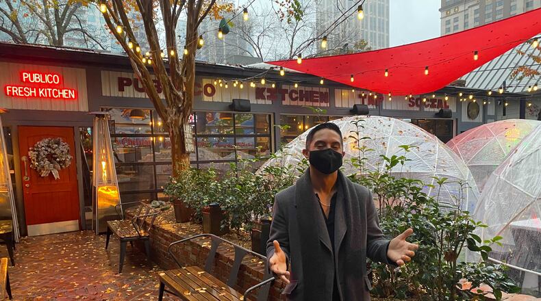 Publico co-owner Mike Duganier is trying to keep things merry and bright at his Midtown restaurant. Ligaya Figueras/ligaya.figueras@ajc.com