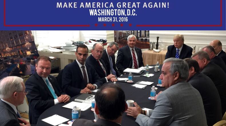 In this photo from President Donald Trump's Twitter account, George Papadopoulos, third from left, sits at a table with then-candidate Trump and others at what is labeled at a national security meeting in Washington that was posted on March 31, 2016. (Donald Trump's Twitter account via AP)