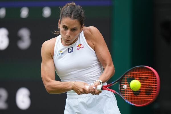 Emma Navarro of the U.S. returns to Barbora Krejcikova of Czech Republic during their women's singles third round match at the Wimbledon Tennis Championships in London, Saturday, July 5, 2025.(AP Photo/Alastair Grant)