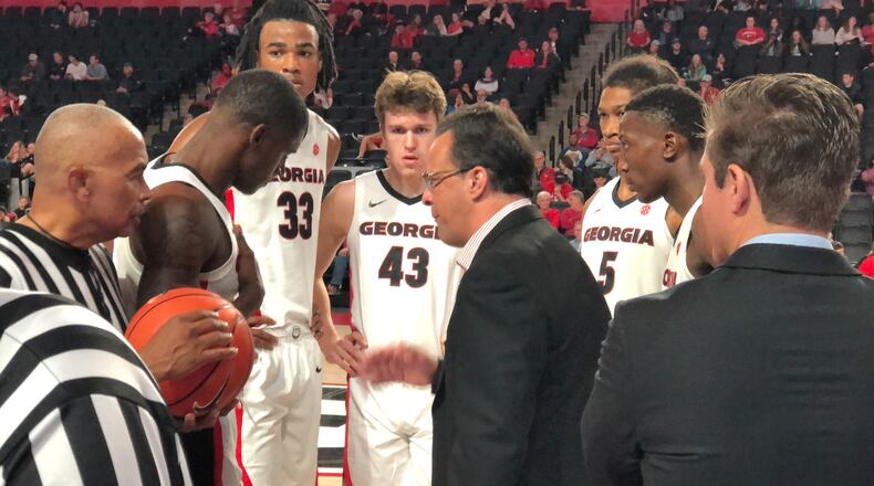 Tom Crean shares a teachable moment with the Bulldogs during exhibition victory over West Georgia.