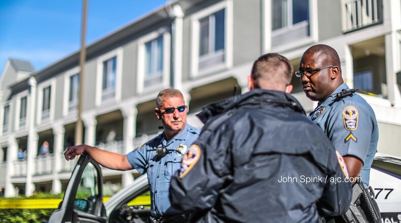 Detectives are trying to determine how and why two people were killed inside a room at the Norcross Inn on Thursday morning.