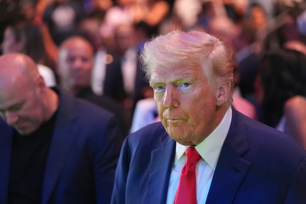 President Donald Trump attends the UFC-316 mixed martial arts event, at the Prudential Center, Saturday, June 7, 2025, in Newark, N.J., with UFC's Dana White, left. (AP Photo/Frank Franklin II)