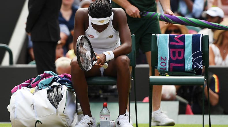 Cori Gauff hangs her head after her fourth-round loss to Simona Halep of Romania Monday, July 8, 2019, at Wimbledon championships in London.