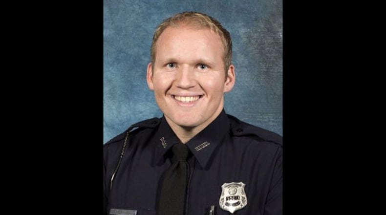 A marker celebrating the life of slain Henry County Police Officer Michael Smith will be unveiled Tuesday in McDonough. (Georgia Bureau of Investigation via AP)