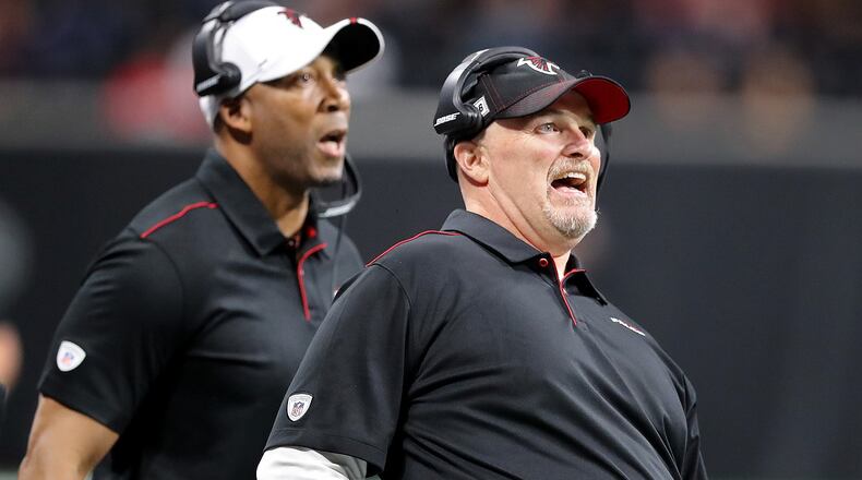 Falcons coach Dan Quinn uses body English during a field-goal attempt while playing the Washington Redskins on Thursday, August 22, 2019, in Atlanta.  Curtis Compton/ccompton@ajc.com