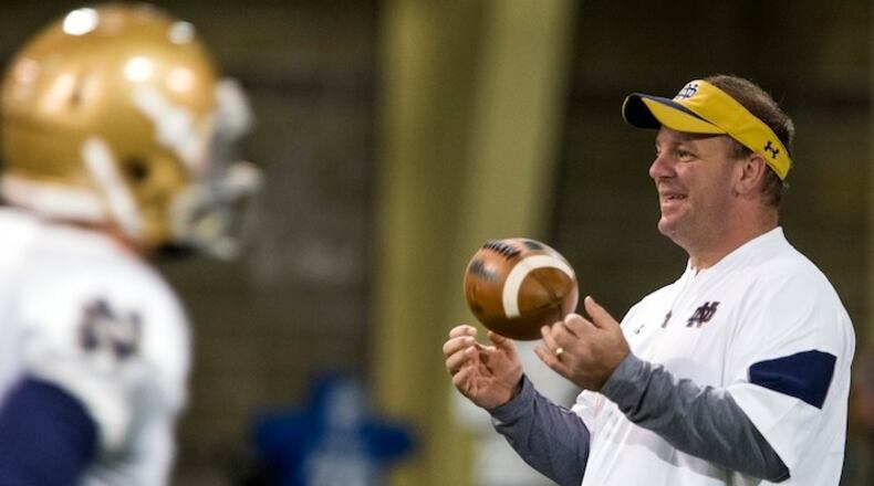 Notre Dame Defensive Coordinator Mike Elko runs drills during practice, Wednesday, March 22, 2017, in South Bend. Tribune Photo/BECKY MALEWITZ