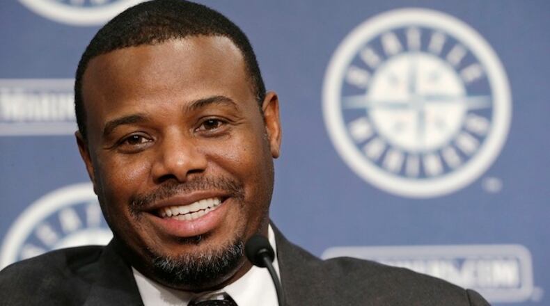 FILE - In this Aug. 9, 2013, file photo, former Seattle Mariners' Ken Griffey Jr. speaks at a news conference following a luncheon in his honor at the Mariners' ballpark in Seattle. Ken Griffey Jr. seems assured of election to the Baseball hall of Fame on the first try Wednesday, Jan. 6, 2016, possibly with a record vote of close to 100 percent. Mike Piazza, Jeff Bagwell and Tim Raines also were strong candidates to gain the 75 percent needed for baseball's highest honor. (AP Photo/Elaine Thompson, File)