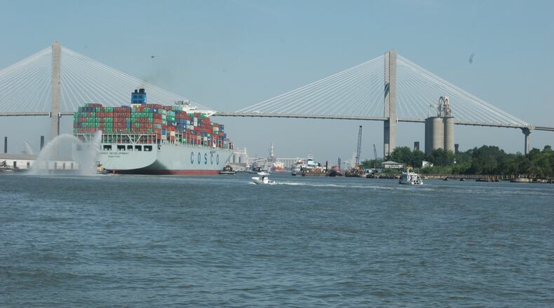 The cargo ship Cosco Development passes under the Talmadge Memorial Bridge en route to the Garden City Terminal on the Savannah River in May 2017.