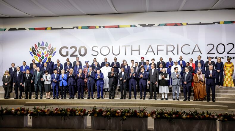 Leaders and delegates pose for a group photo, on the opening day of the G20 Leaders' Summit, in Johannesburg, South Africa, Saturday, Nov. 22, 2025. (Gianluigi Guercia/Pool Photo via AP)