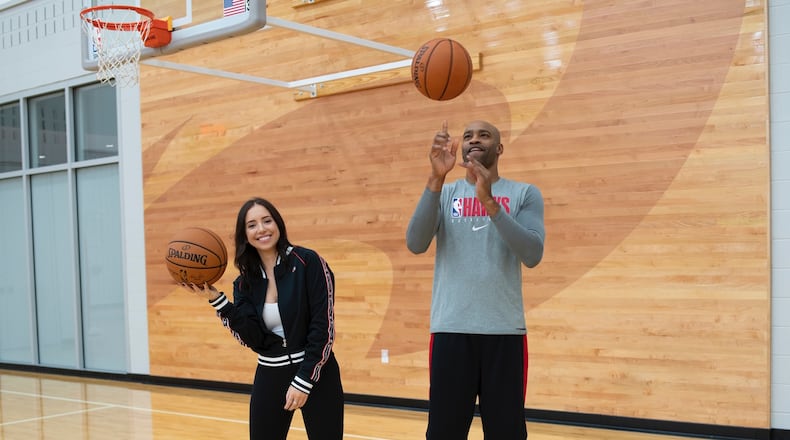 Annie Finberg with former NBA star Vince Carter.