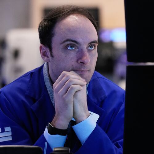 Specialist Joseph Maguire works at his post on the floor of the New York Stock Exchange, Tuesday, Feb. 3, 2026. (AP Photo/Richard Drew)