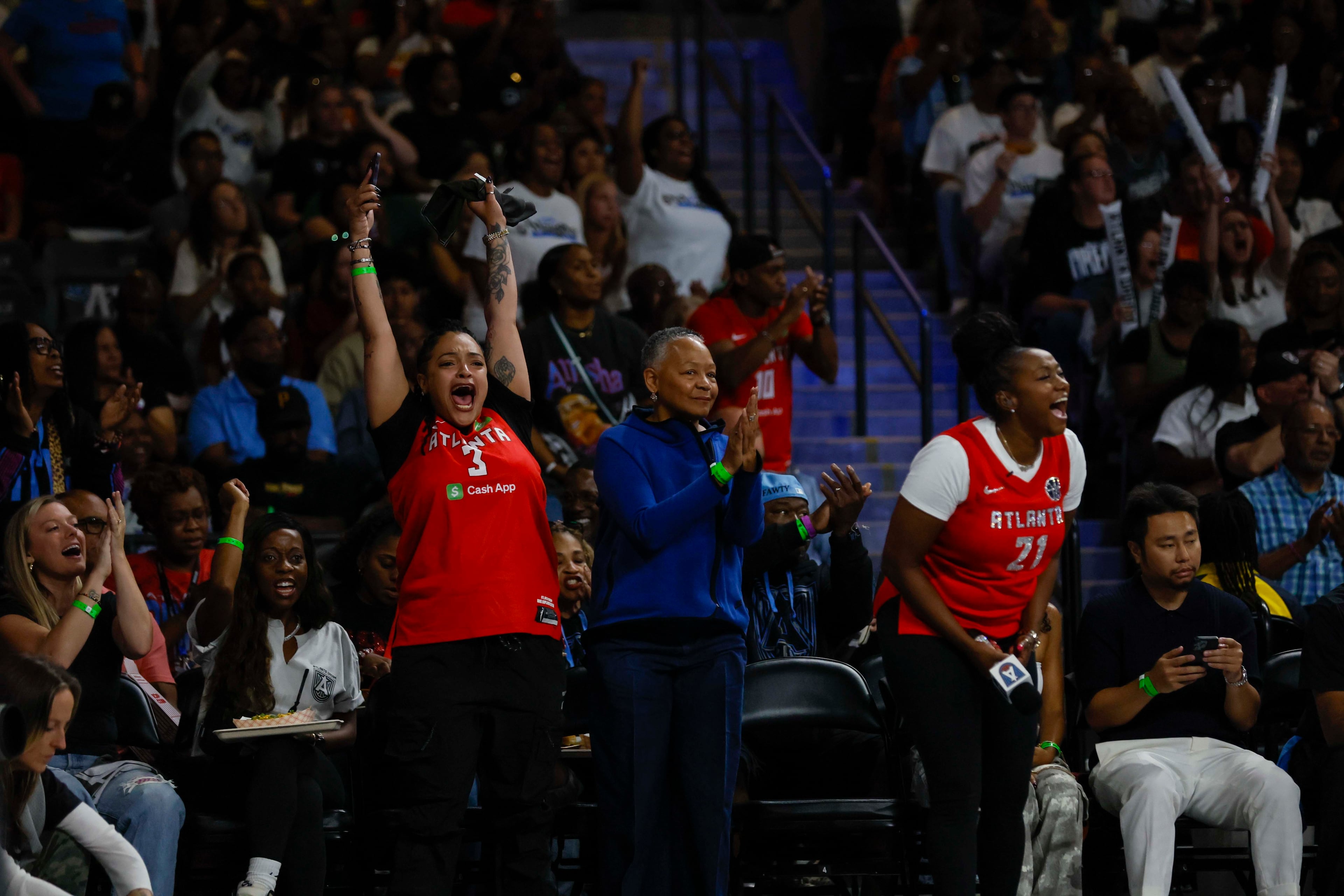 Atlanat Dream fans rectas after a basket during the first half of a WNBA first-round playoff game against the Indiana Fever at Gateway Center Arena on Thursday, Sept. 18, 2024, in Atlanta. (Miguel Martinez/ AJC)